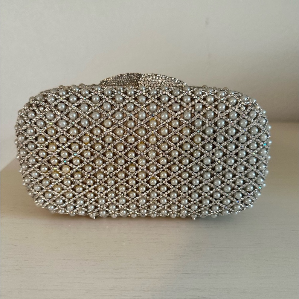 Silver, beaded clutch.